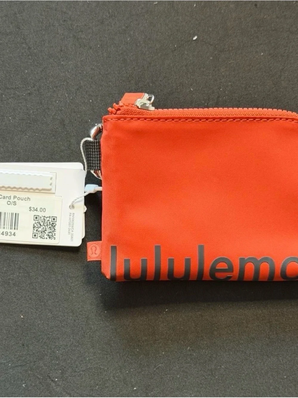 lululemon athletica small zip card pouch in bright coral red